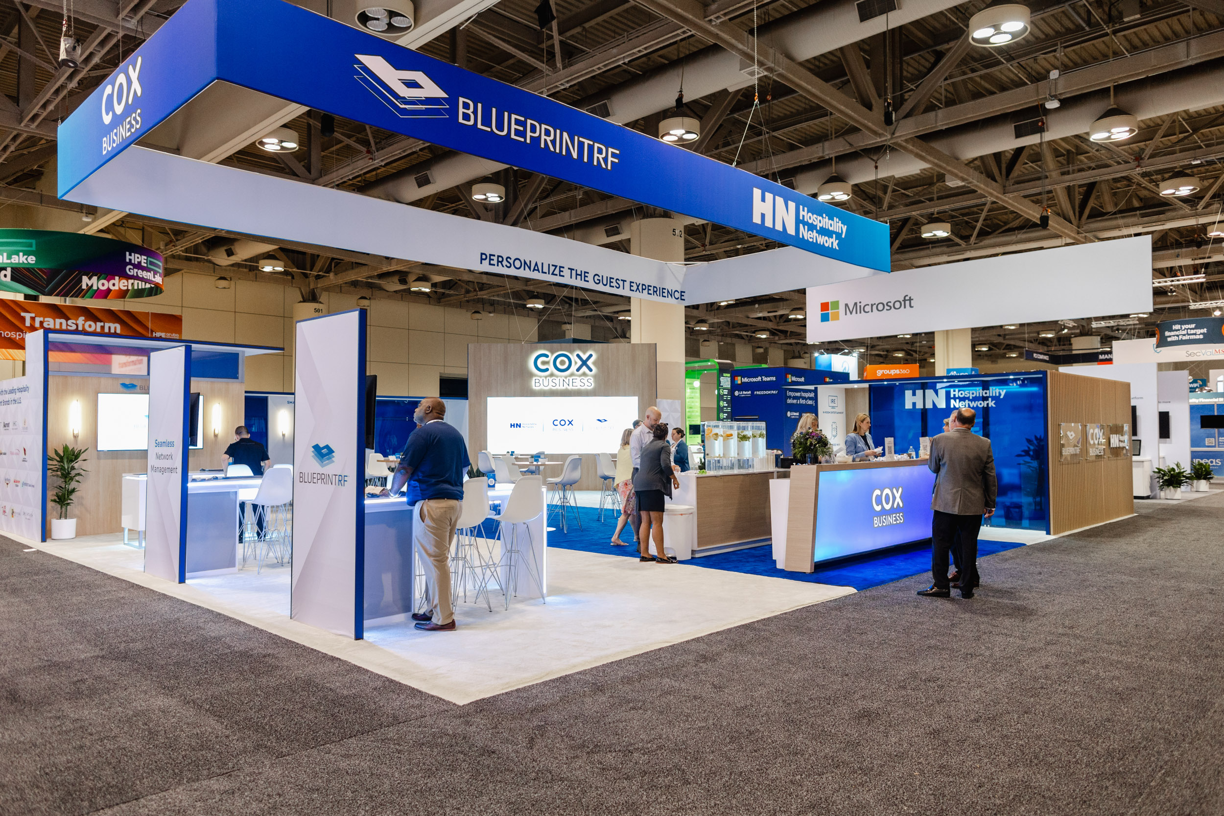 A Toronto trade show booth featuring a blue and white color scheme.