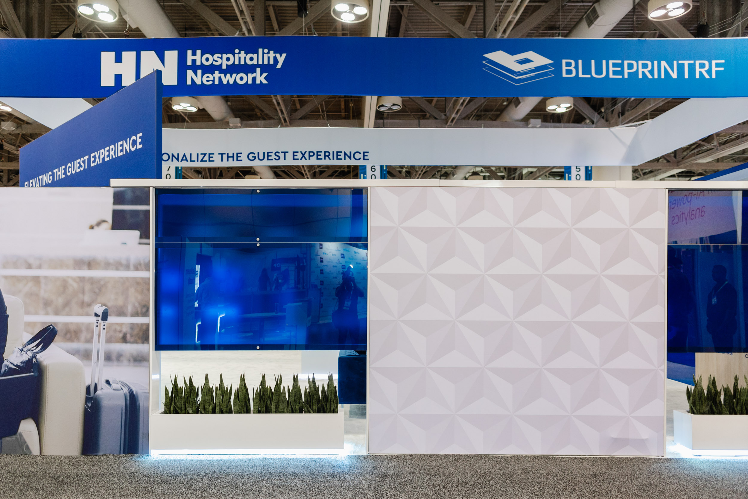 A Toronto trade show featuring a booth for blueprint photography.