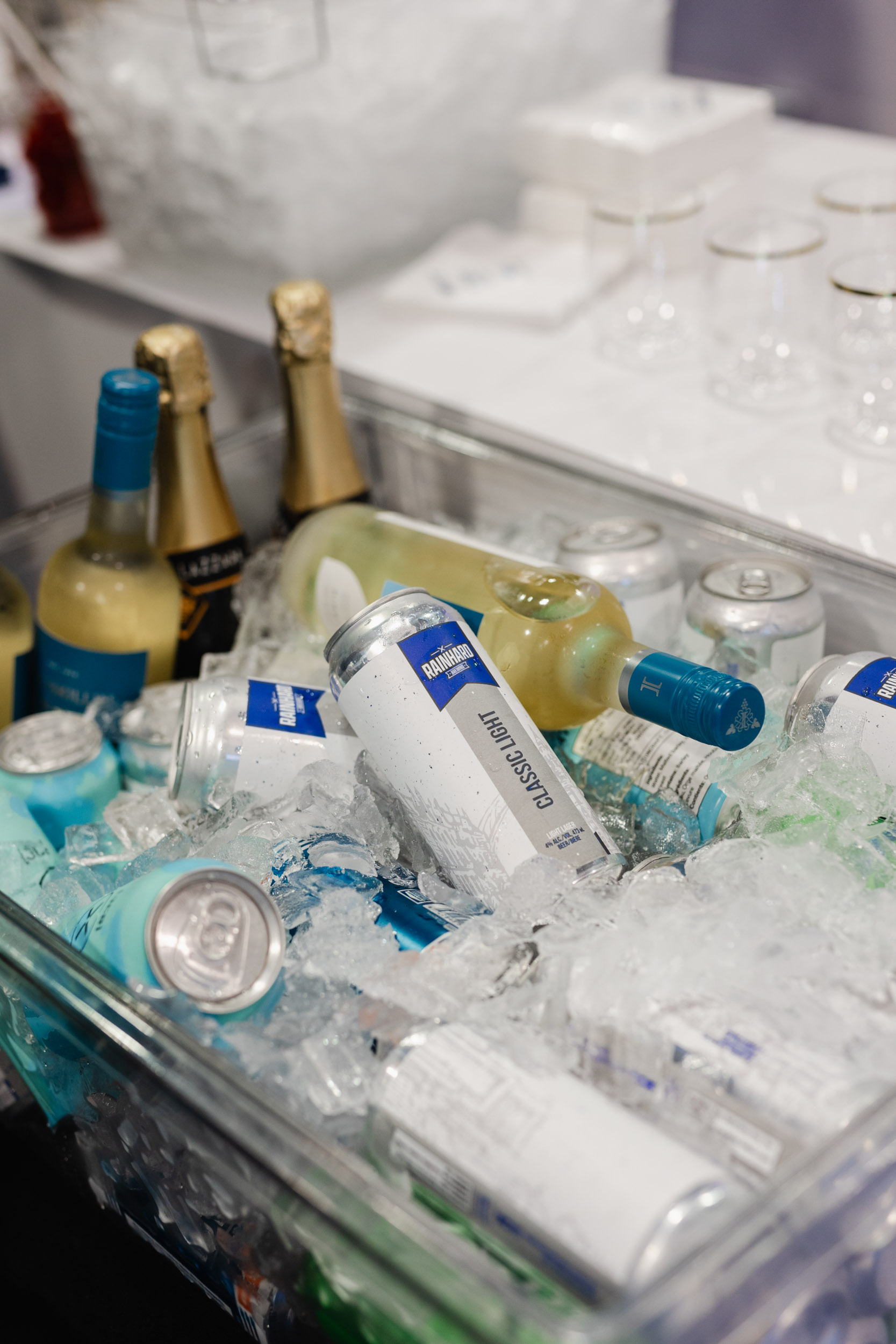 Toronto Trade show photography: An ice tray filled with cans and bottles captured in stunning images.