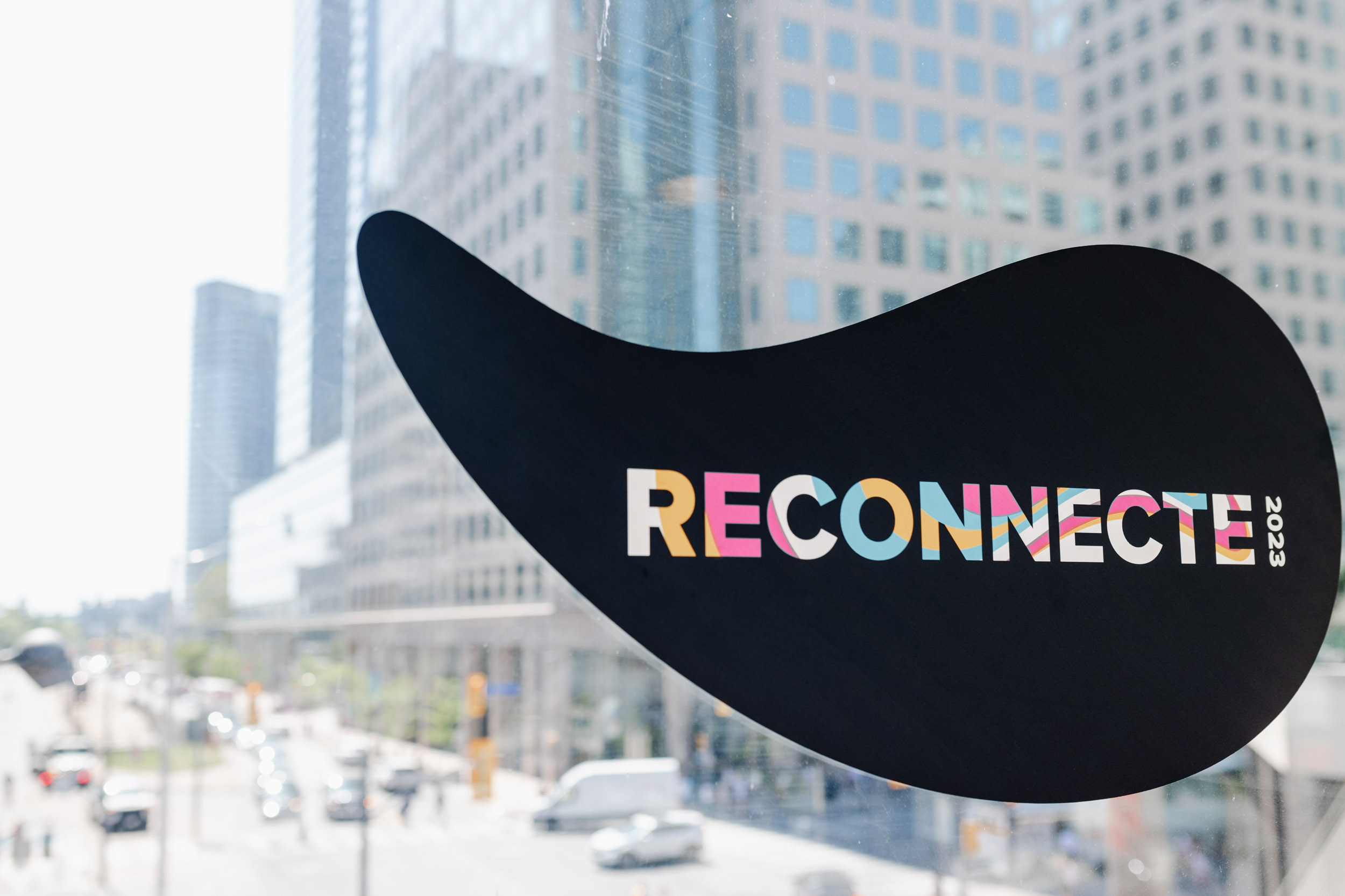 A conference building with the word "reconnect" sign.