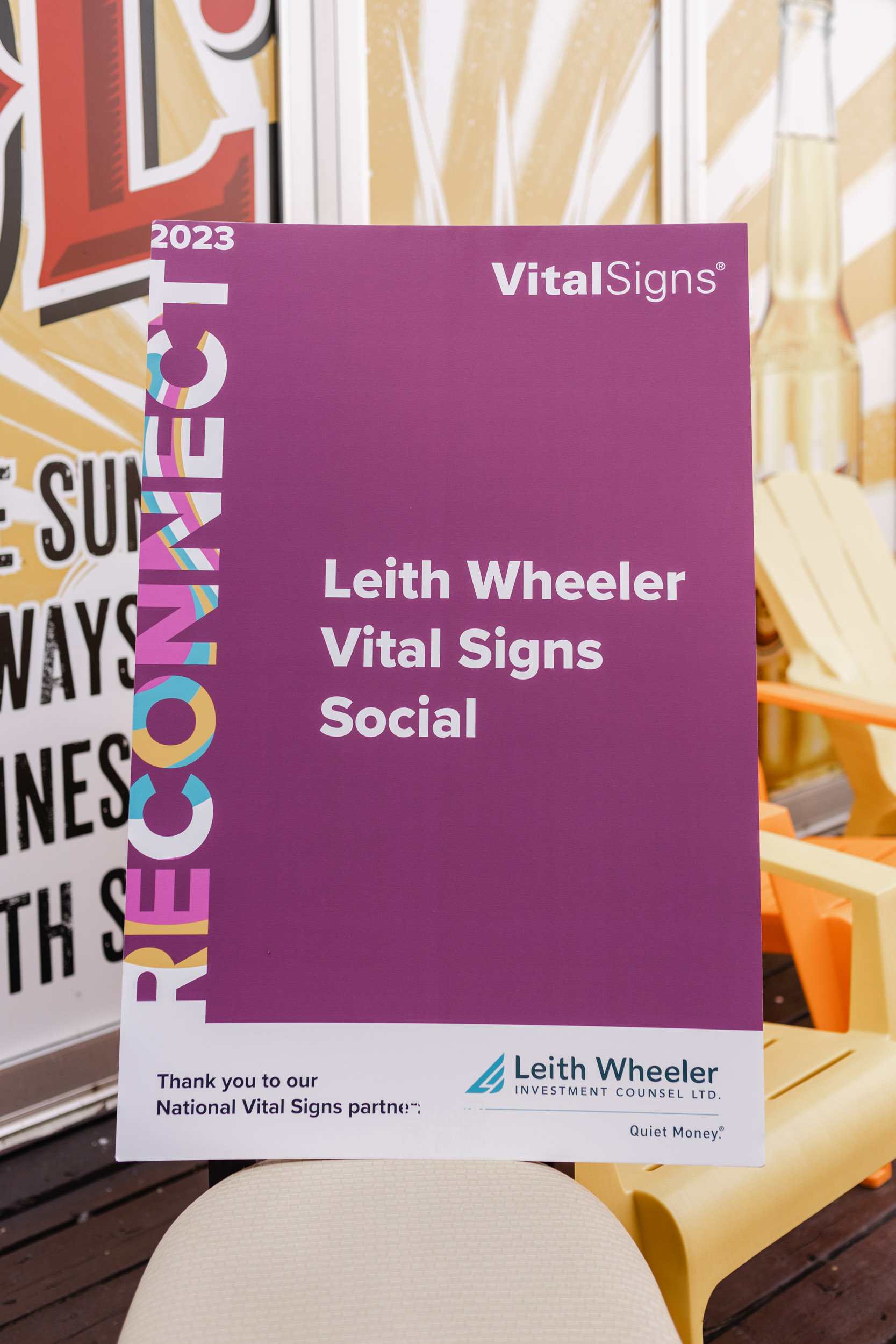 Photographed conference signage displaying "Vital Signs Social.