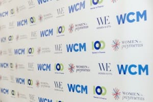 Wcm logo on a wall captured in Grand Opening Photography.