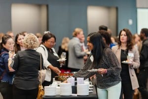 Grand Opening Photography: Capturing a group of people at a business event.