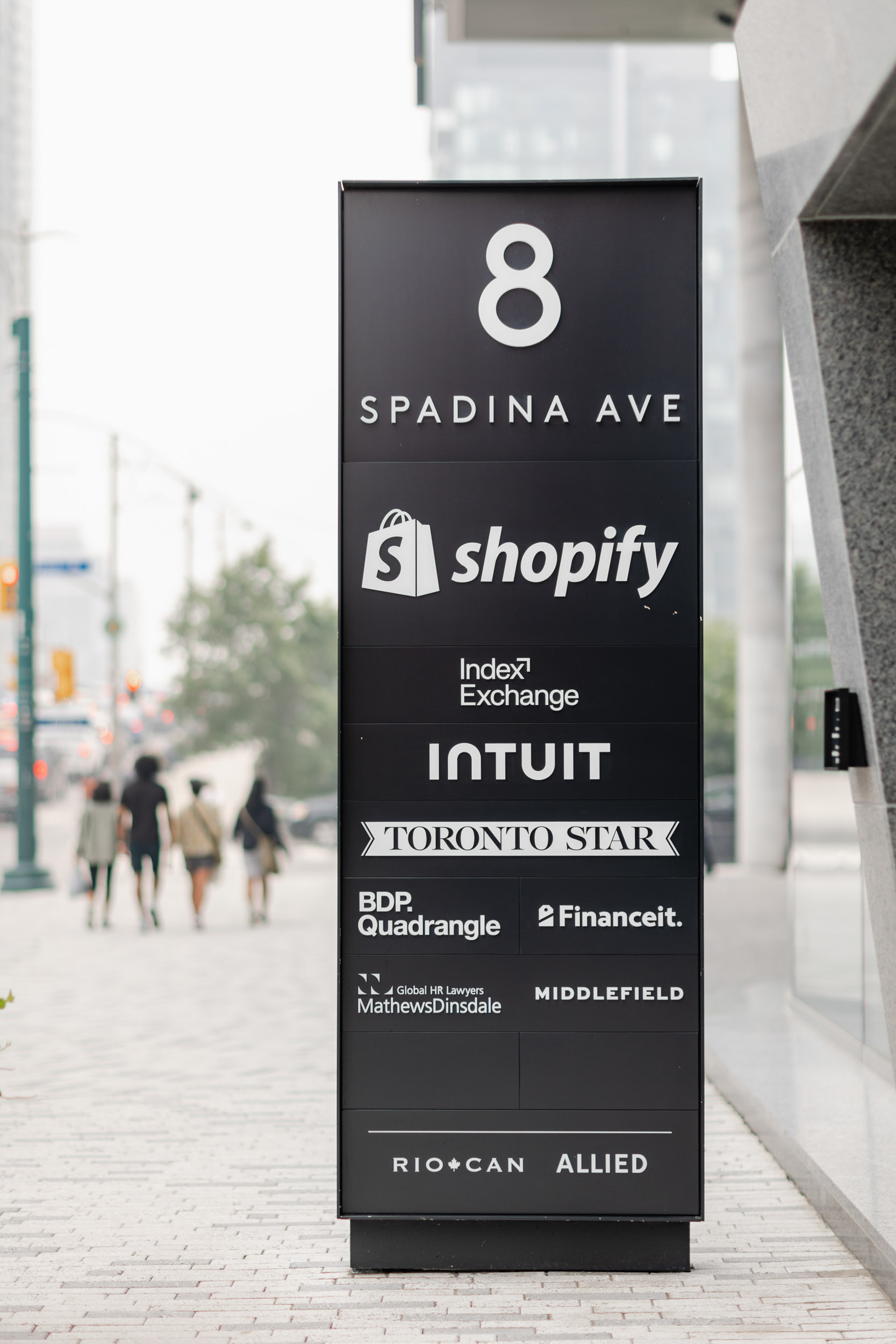 A street billboard featuring a Shopify advertisement in partnership with Index Exchange.