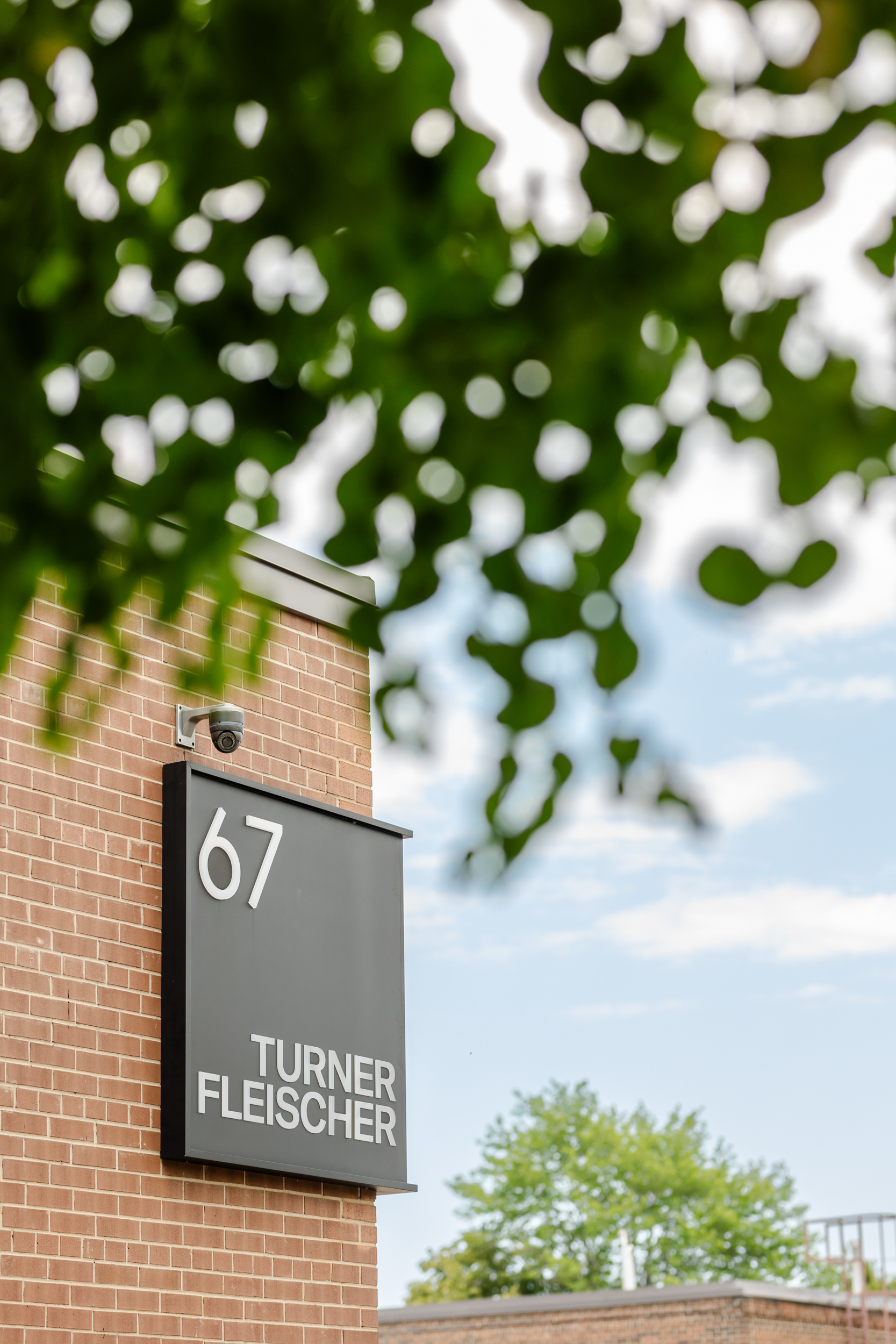 Turner Fleischer building with a sign that reads 67 turner fehlscher.
