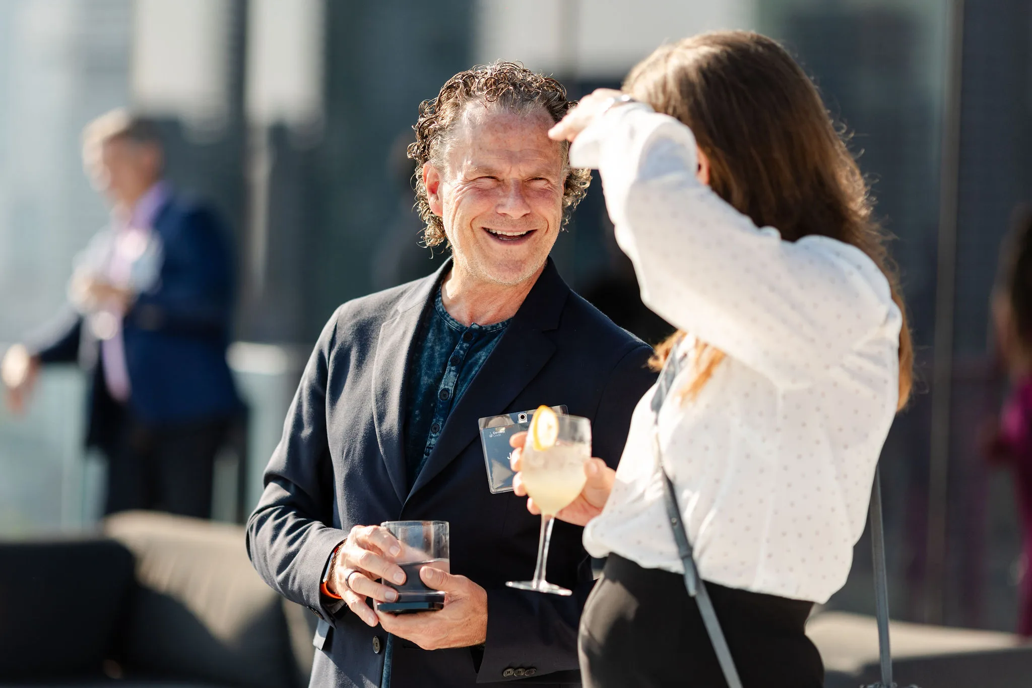 Man, woman, laughing.