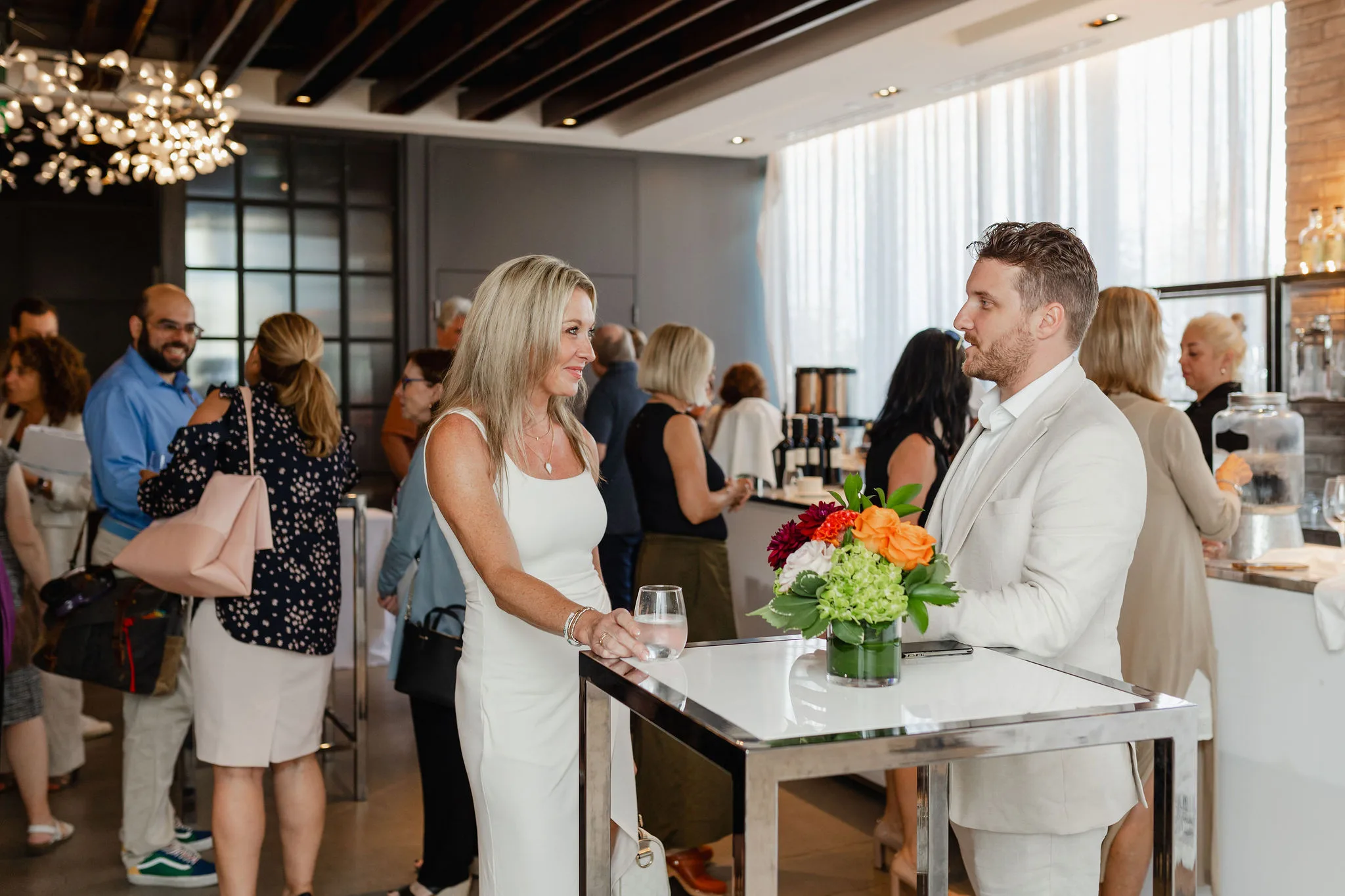 A man and woman at an event.