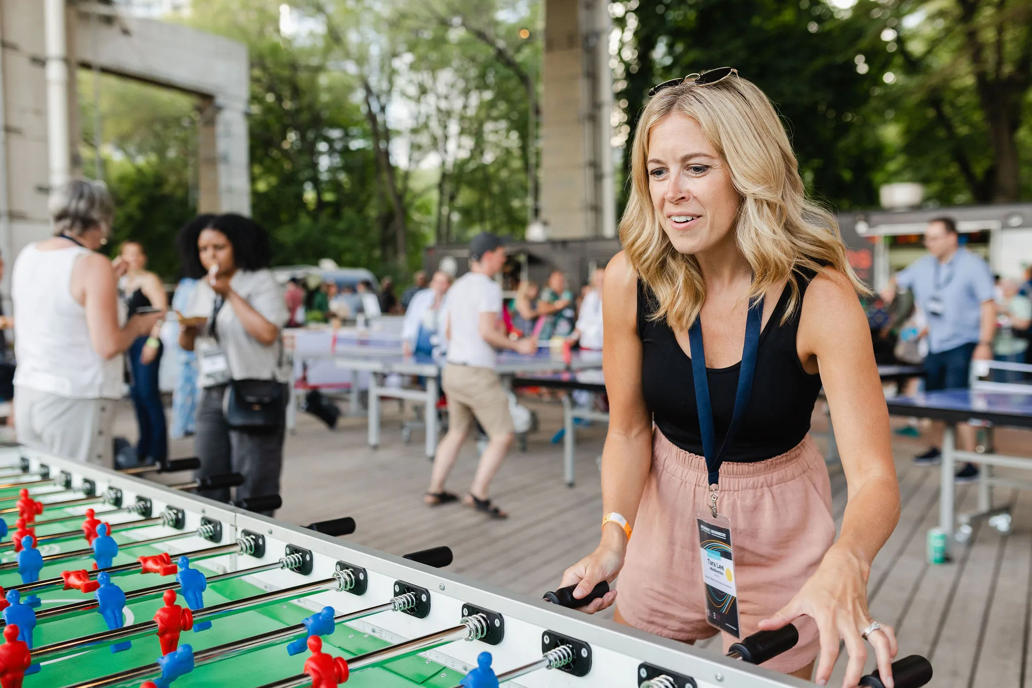 Woman, foosball
