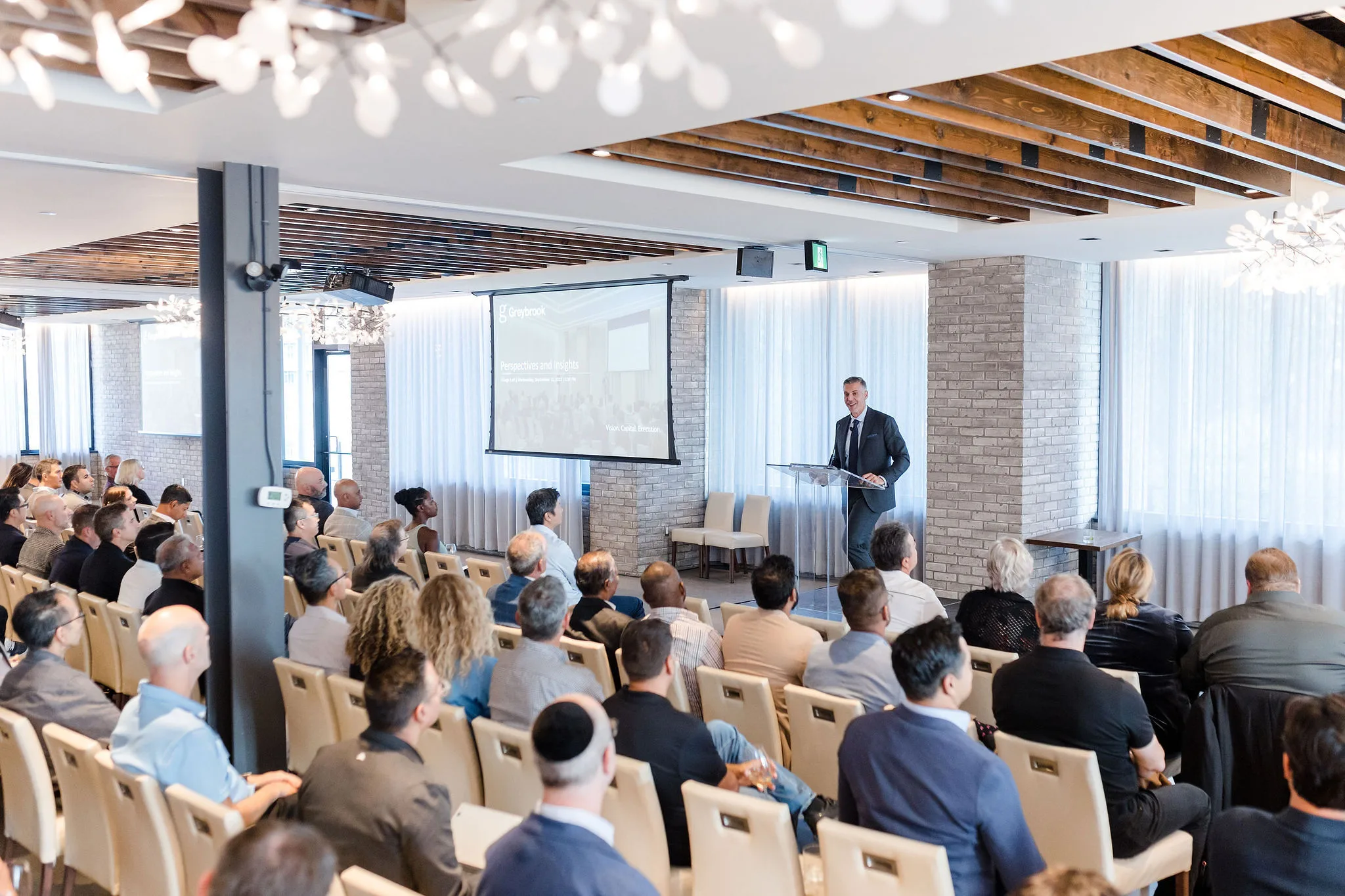 Large group, conference room.