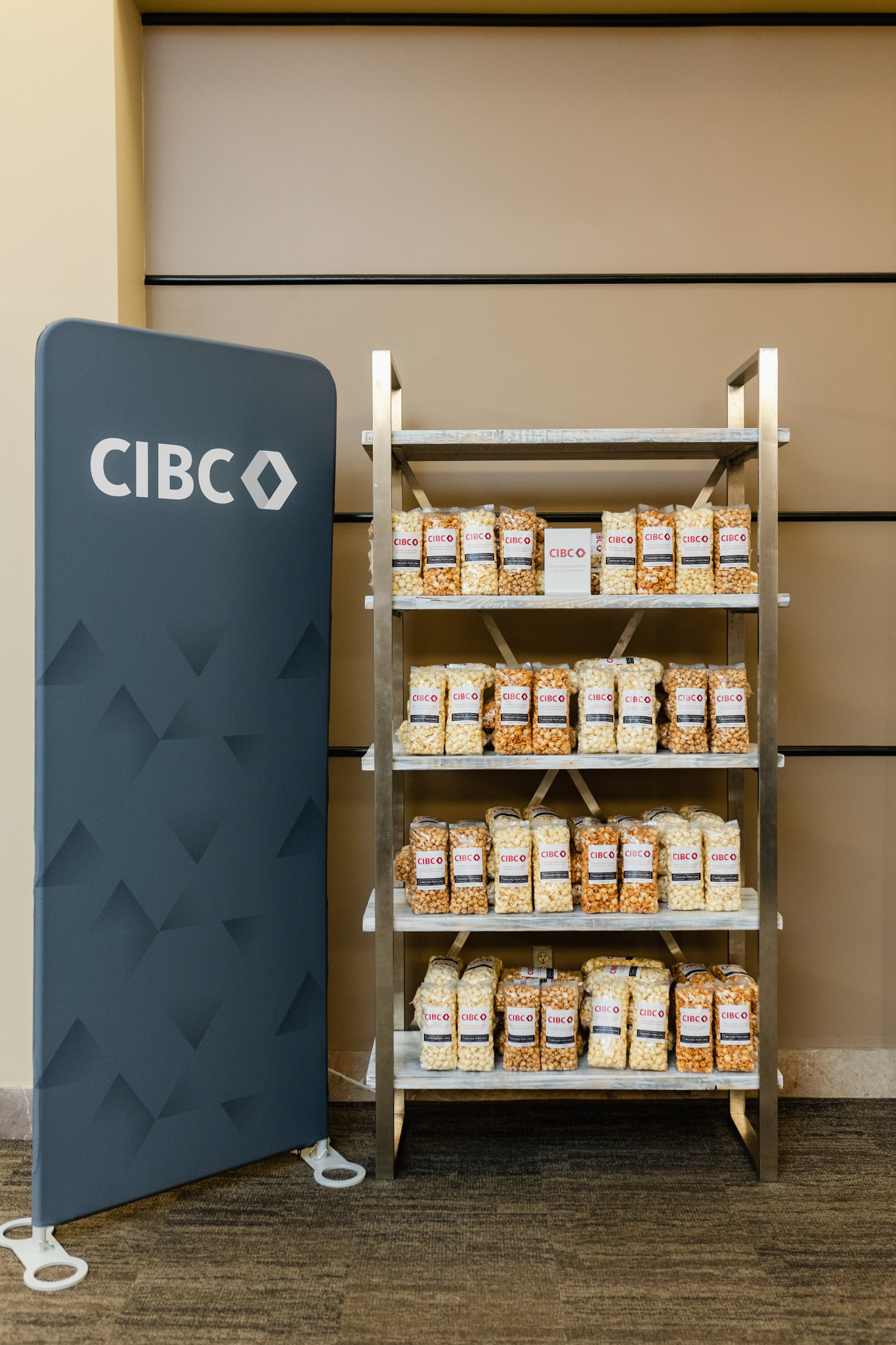 Cibco's food display in the lobby of a building at a conference.