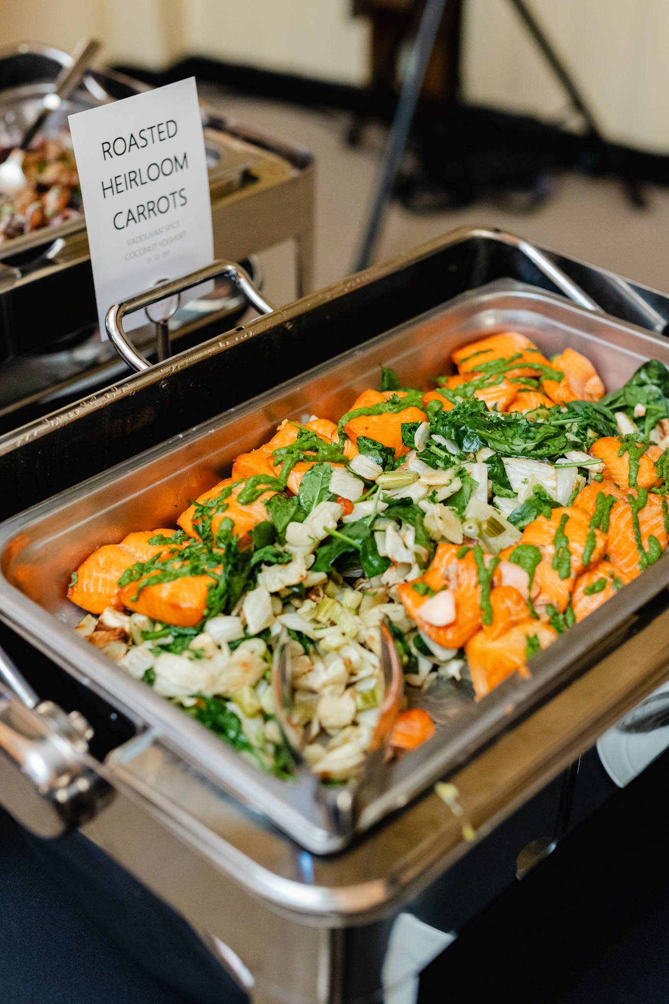 A tray of food on a table captured in conference photography.
