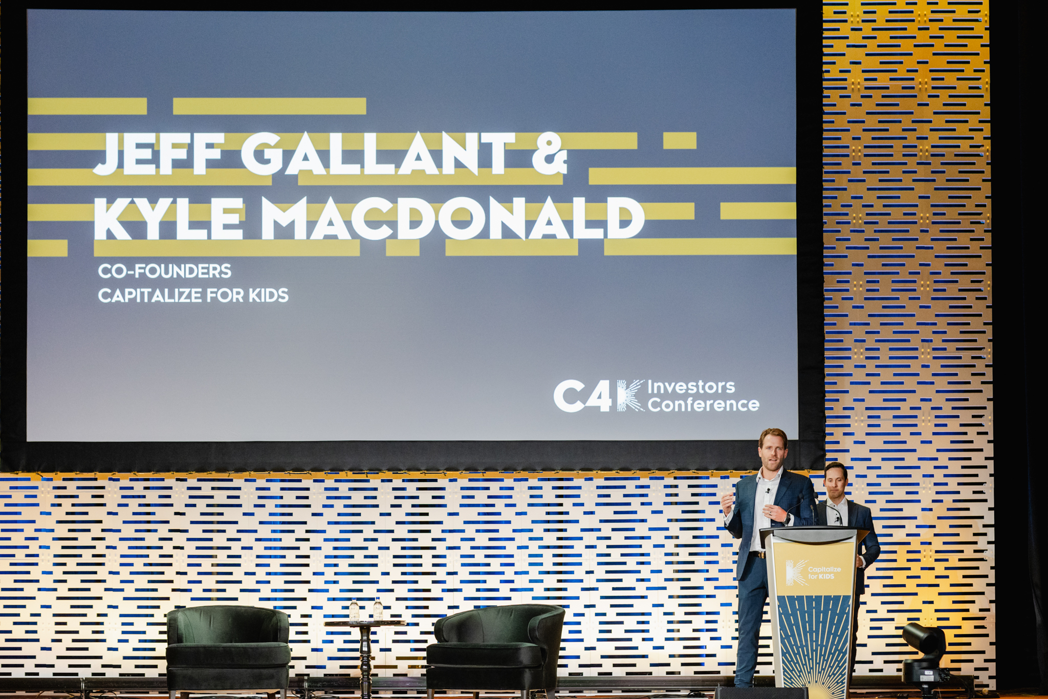 Jeff gallant & kyle macdonald on stage at the conference.