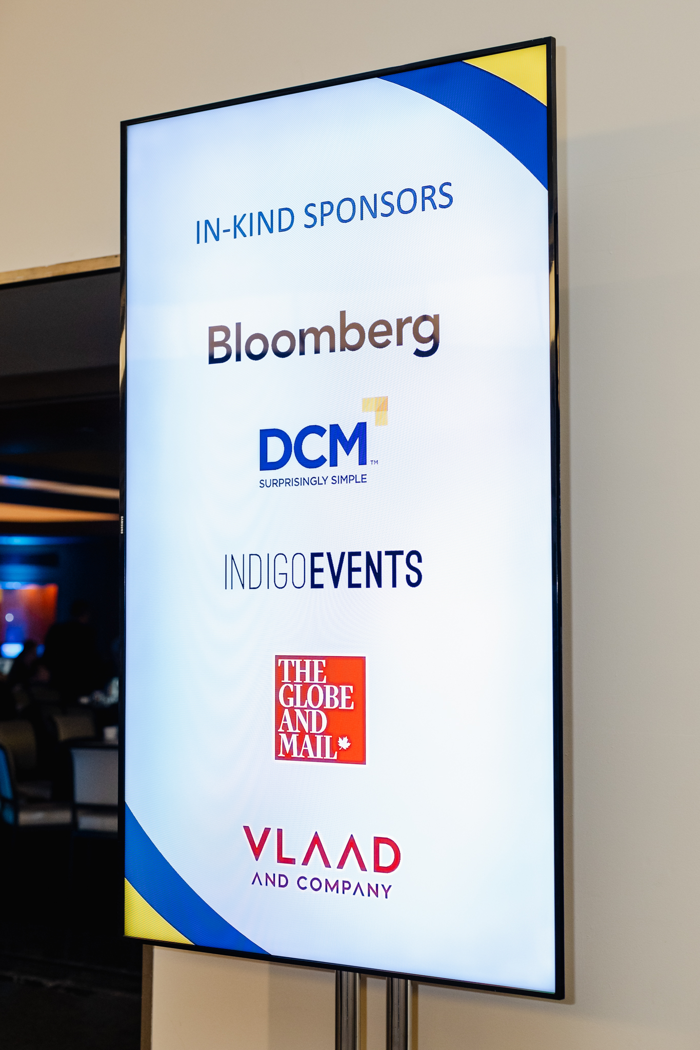 A sign advertising inkind sponsors and inkind events at the DCMC conference.