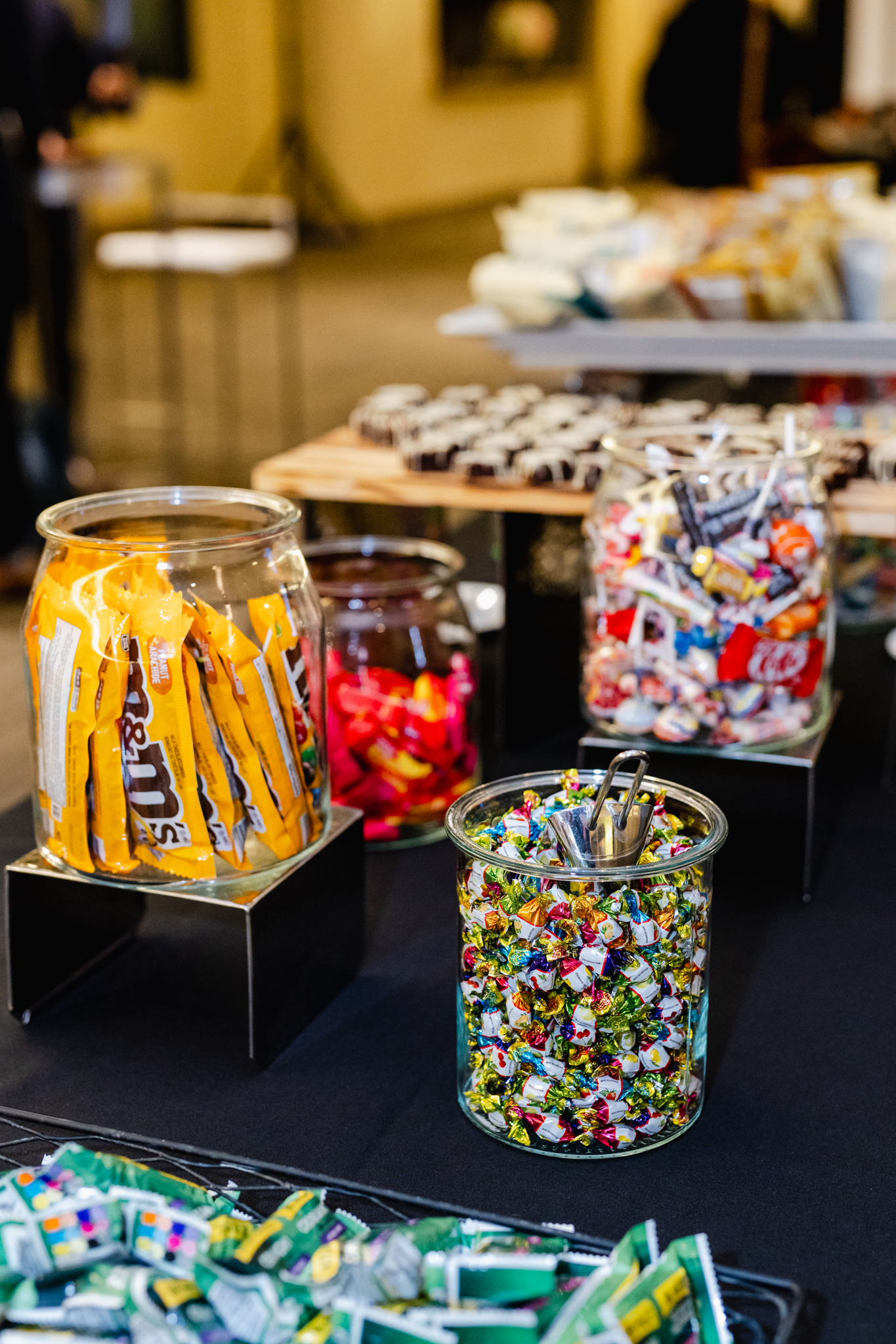 Conference Photography:
Capture the vibrant display of a carefully arranged table full of colorful and delectable candy at your next conference event.