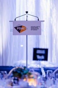 A podium with a sign on it, prepared for event photography.