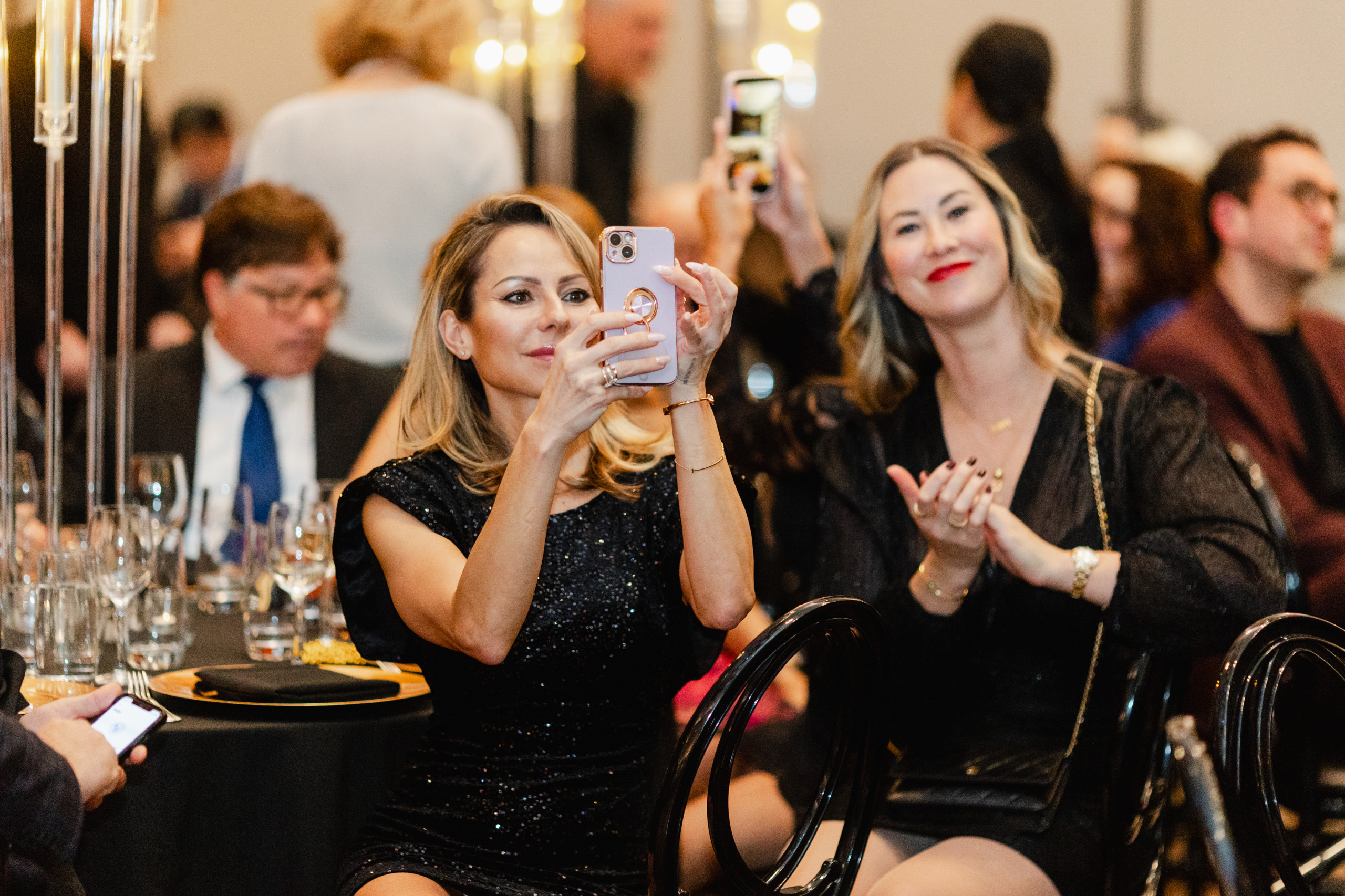 A group of women taking a selfie.